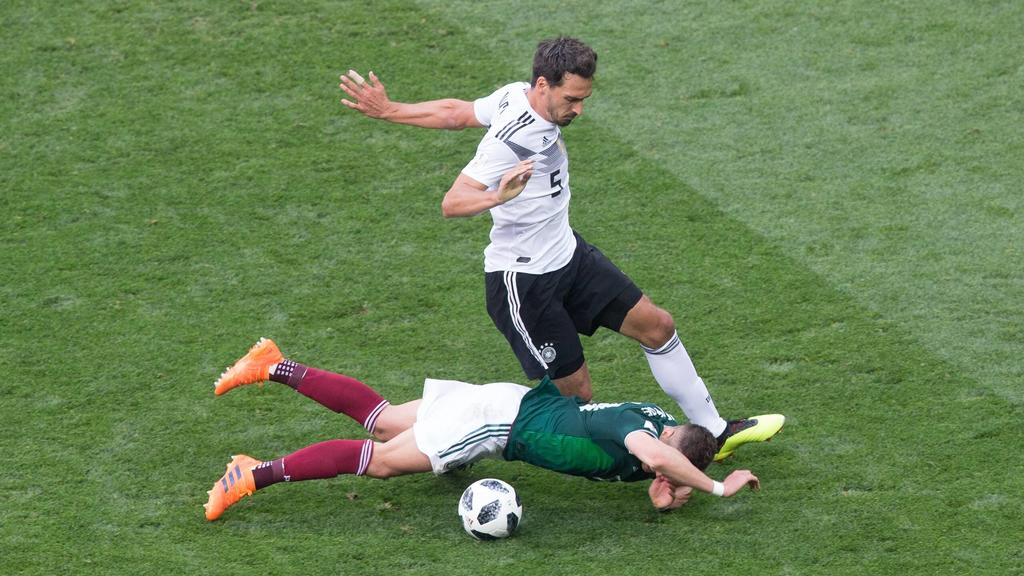 June 17, 2018 - Moscow, Russia - Javier Hernandez of Mexico vies Mats Hummels of Germany during the Russia 2018 World Cup Group F football match between Germany and Mexico at the Luzhniki Stadium in Moscow on June 17, 2018. Germany v Mexico: Group F