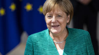 28.06.2018, Belgien, Brüssel: Bundeskanzlerin Angela Merkel lächelt beim EU Gipfel im Europa-Gebäude. Beim Treffen der EU Staats- und Regierungschefs steht unter anderem die Flüchtlingspolitik auf dem Programm. Foto: Marko Erd/TASR/dpa +++ dpa-Bildfunk +++