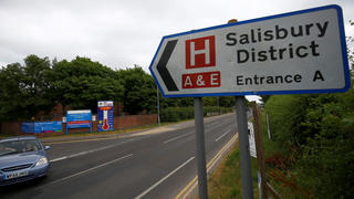 Signpost indicates the entrance to Salisbury District Hospital where two people were hospitalised and police declared a 'major incident', in Salisbury, Wiltshire, Britain, July 4, 2018. REUTERS/Henry Nicholls