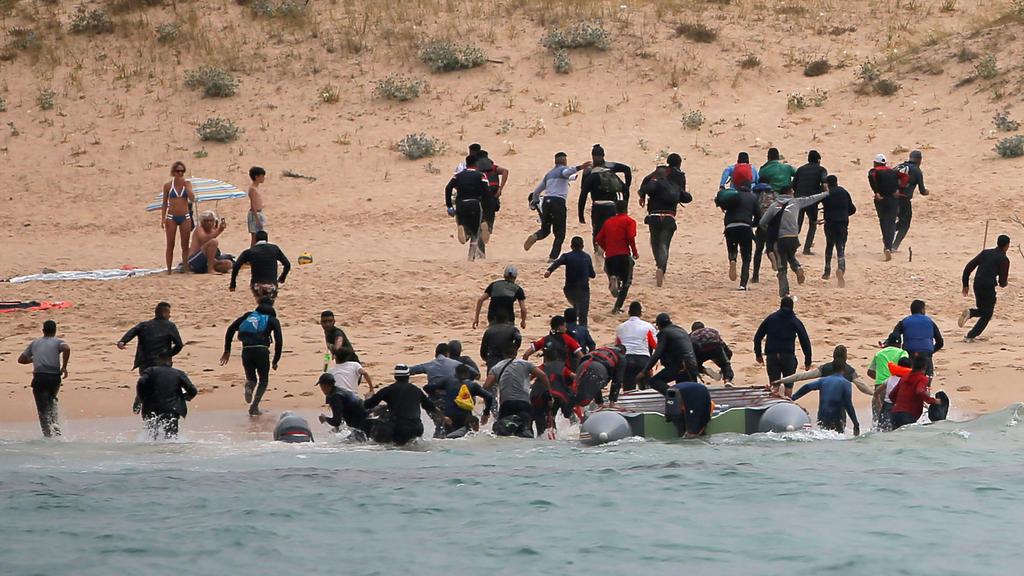 Migranten am Strand von Canuelo
