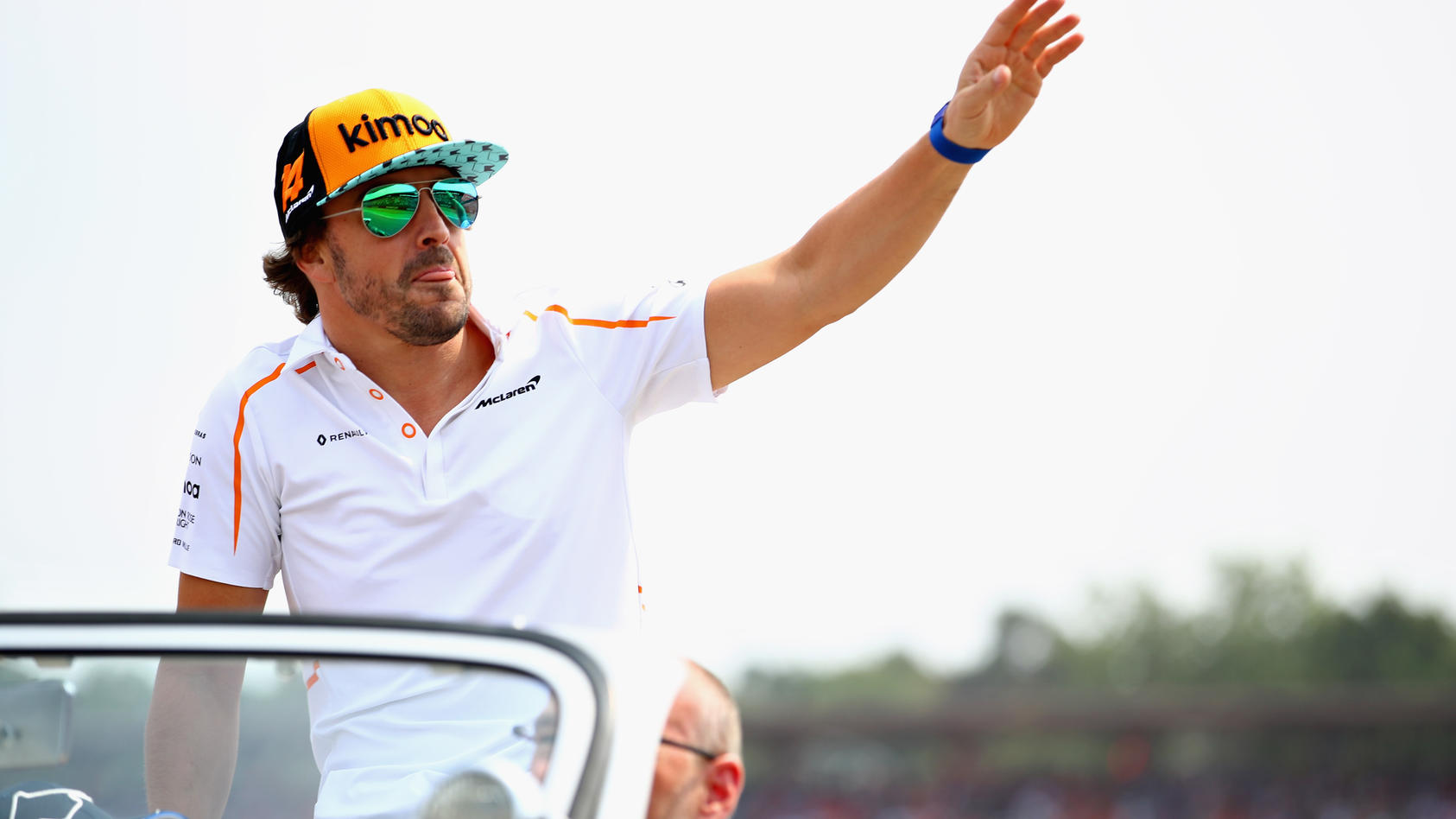HOCKENHEIM, GERMANY - JULY 22: Fernando Alonso of Spain and McLaren F1 waves to the crowd on the drivers parade before the Formula One Grand Prix of Germany at Hockenheimring on July 22, 2018 in Hockenheim, Germany.  (Photo by Mark Thompson/Getty Ima