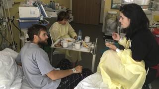 Anti-Kremlin activist and publisher of a Russian online news portal Pyotr Verzilov (L), who undergoes treatment at a hospital, speaks with founder of Pussy Riot protest group Nadezhda Tolokonnikova (R), in Berlin, Germany in this handout photo obtained on September 25, 2018. Nadezhda Tolokonnikova/Handout via REUTERS  THIS IMAGE HAS BEEN SUPPLIED BY A THIRD PARTY. NO RESALES. NO ARCHIVES