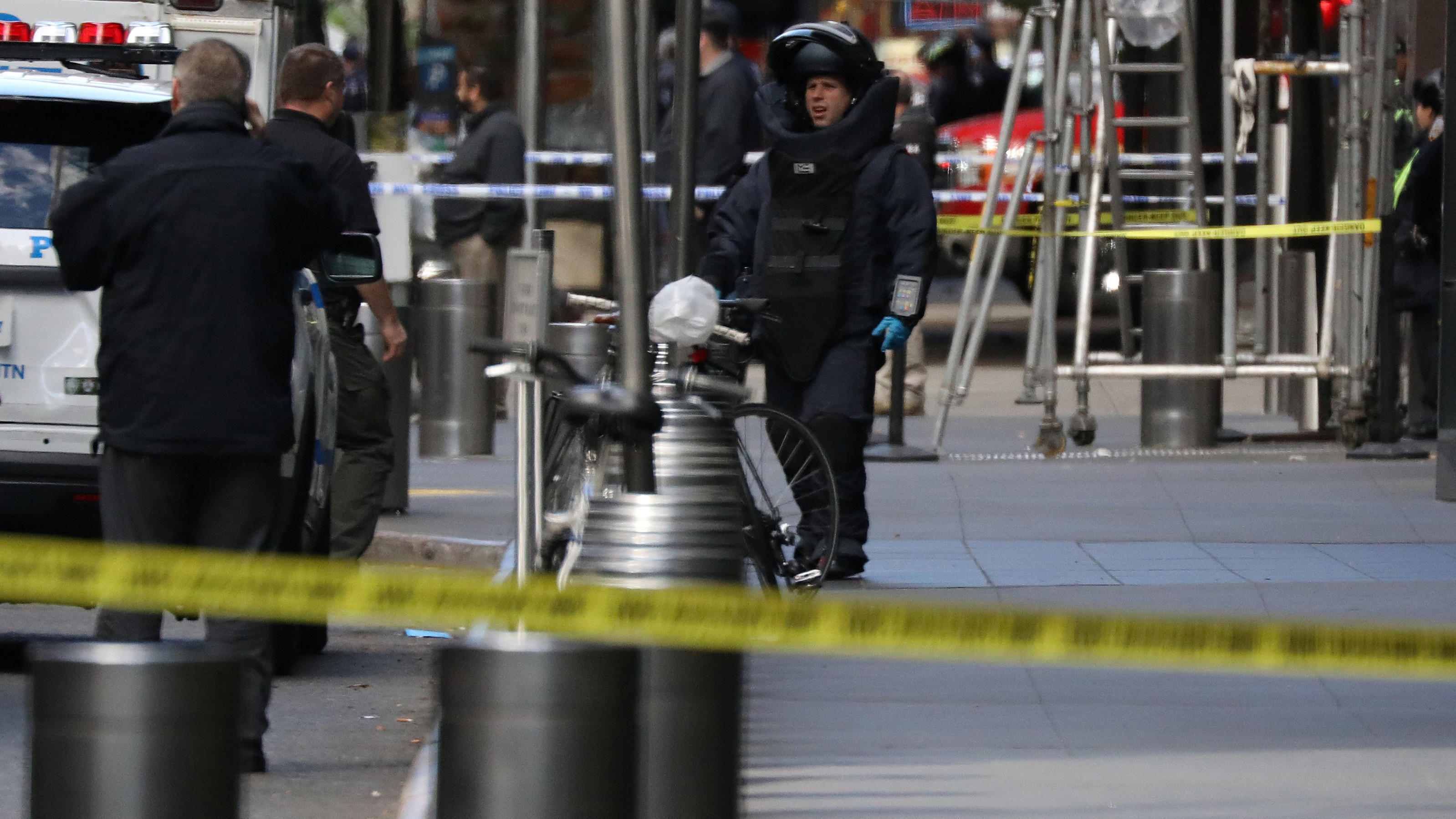A member of the New York Police Department bomb squad is pictured outside the Time Warner Center in the Manahattan borough of New York City after a suspicious package was found inside the CNN Headquarters in New York, U.S., October 24, 2018. REUTERS/
