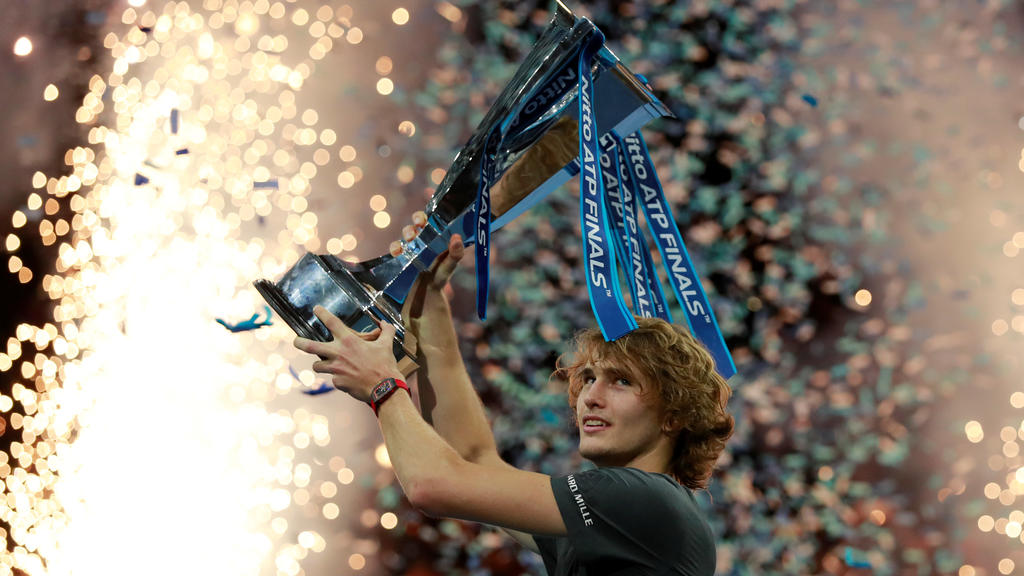 Tennis - ATP Finals - The O2, London, Britain - November 18, 2018   Germany's Alexander Zverev celebrates with the trophy after winning the final against Serbia's Novak Djokovic   Action Images via Reuters/Andrew Couldridge