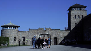 FILE PHOTO: People arrive at the memorial site of the former concentration camp Mauthausen ahead of the commemoration ceremony of liberation, Mauthausen, Austria May 06, 2018. REUTERS/Lisi Niesner/File Photo