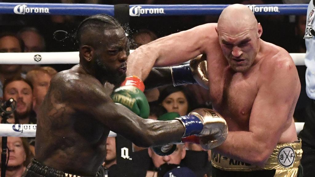 (in color trunks) Deontay Wilder goes 12 rounds with Tyson Fury at the Staple Center Saturday. The fight was draw between both fighters from the judges scoring . Los Angeles, CA. Dec 1,2018. . Wilder-vs-Fury-BOXING PUBLICATIONxINxGERxSUIxAUTxONLY - Z