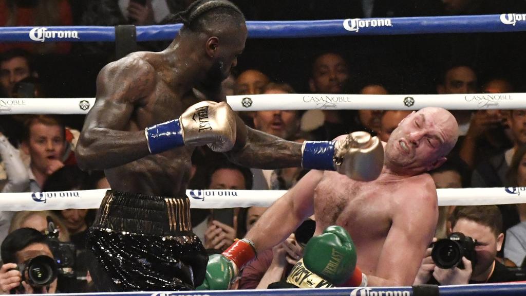 (in color trunks) Deontay Wilder knocks down Tyson Fury a 2nd time in the 12 round at the Staple Center Saturday. The fight was draw between both fighters from the judges scoring . Los Angeles, CA. Dec 1,2018. Wilder-vs-Fury-BOXING PUBLICATIONxINxGER