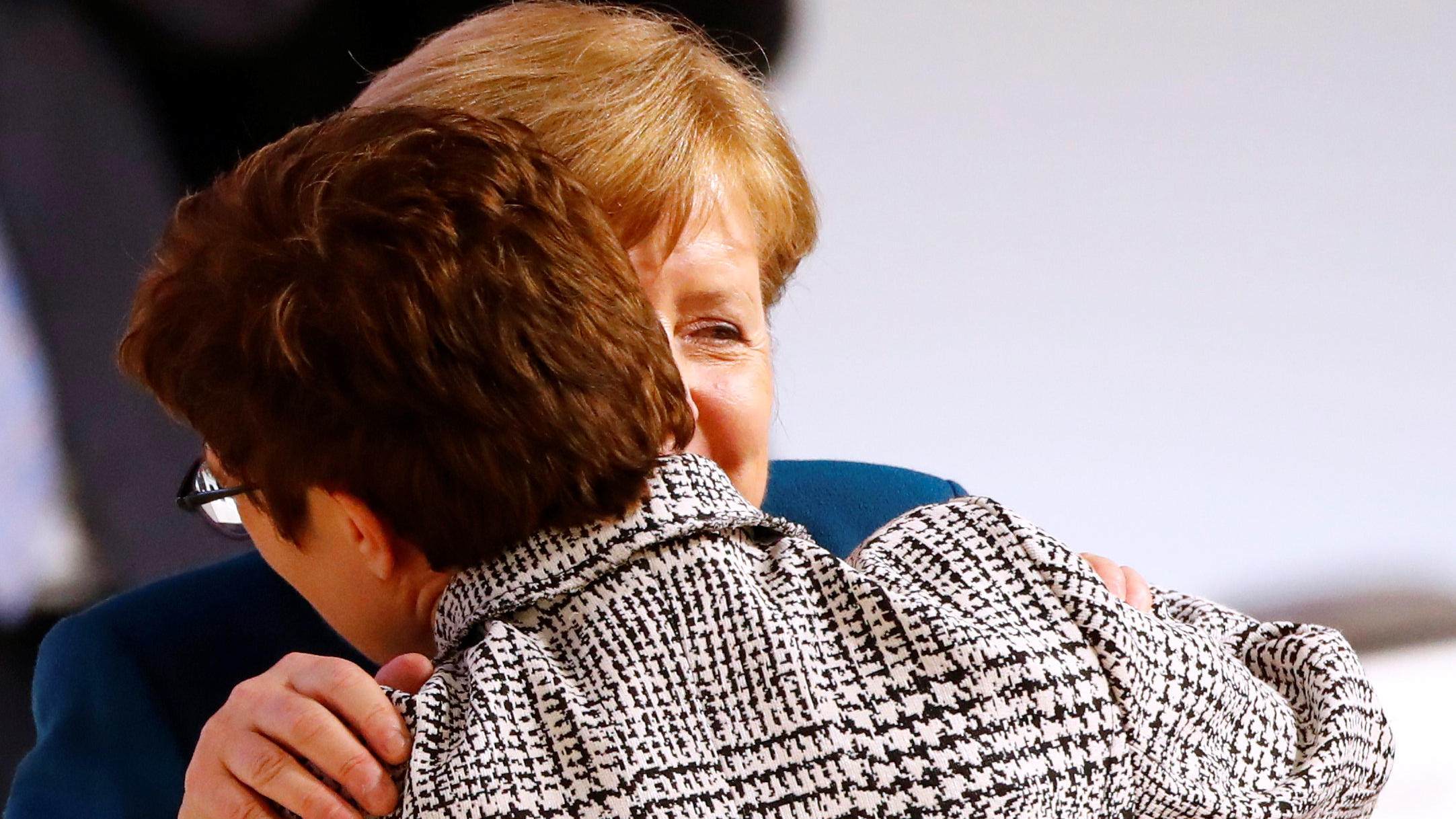 Annegret Kramp-Karrenbauer is embraced by German Chancellor Angela Merkel after being elected as the party leader during the Christian Democratic Union (CDU) party congress in Hamburg, Germany, December 7, 2018. REUTERS/Fabrizio Bensch