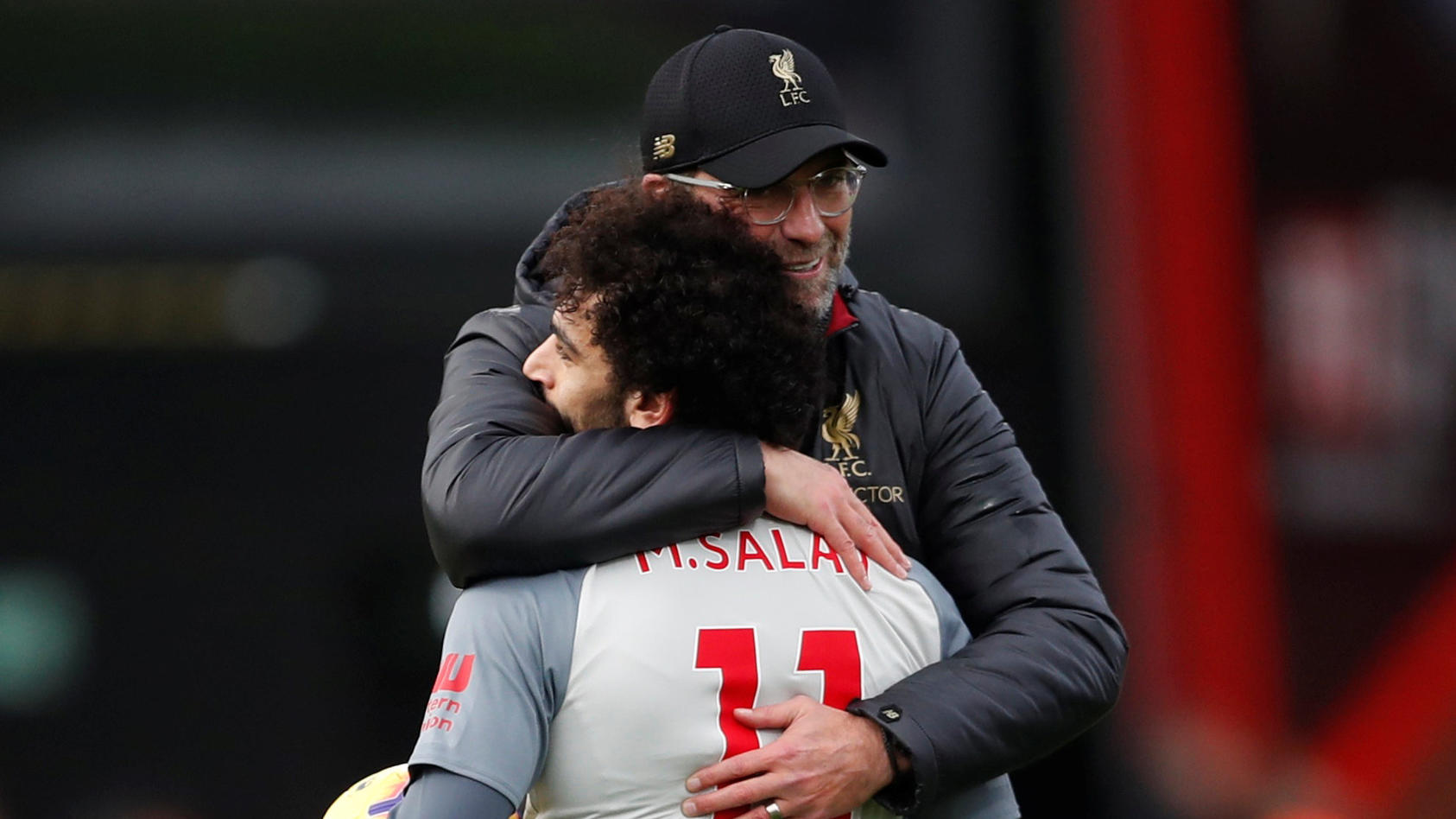 Soccer Football - Premier League - AFC Bournemouth v Liverpool - Vitality Stadium, Bournemouth, Britain - December 8, 2018  Liverpool manager Juergen Klopp celebrates after the match with Mohamed Salah   Action Images via Reuters/Matthew Childs  EDIT