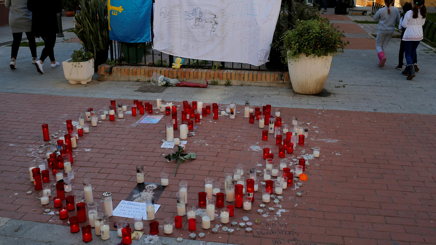 Candles formed in the shape of a heart in remembrance of Julen who fell into deep well in Totalan, are pictured near his house in Malaga