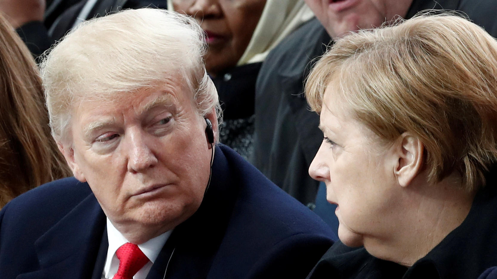 FILE PHOTO: German Chancellor Angela Merkel, and U.S. President Donald Trump attend a commemoration ceremony for Armistice Day, 100 years after the end of the First World War at the Arc de Triomphe in Paris, France, November 11, 2018.  REUTERS/Benoit