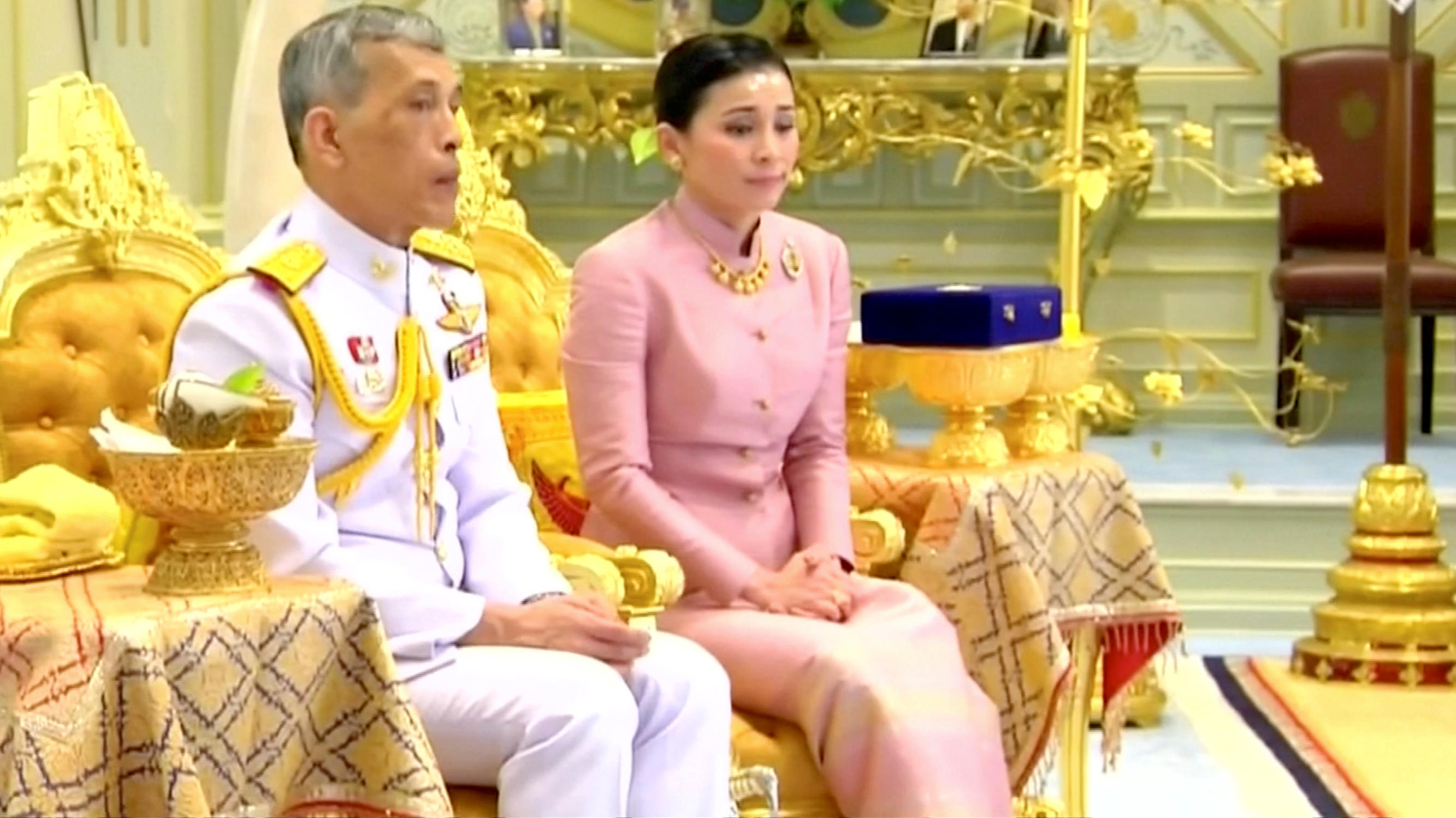King Maha Vajiralongkorn and his consort, General Suthida Vajiralongkorn named Queen Suthida attend their wedding ceremony in Bangkok, Thailand May 1, 2019, in this screen grab taken from a video. Thai TV Pool  THAILAND OUT. NO COMMERCIAL OR EDITORIA