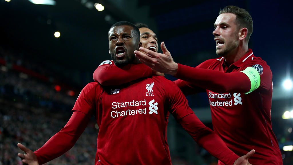 LIVERPOOL, ENGLAND - MAY 07: Georginio Wijnaldum of Liverpool celebrates after scoring his team's third goal with Jordan Henderson and Trent Alexander-Arnold during the UEFA Champions League Semi Final second leg match between Liverpool and Barcelona