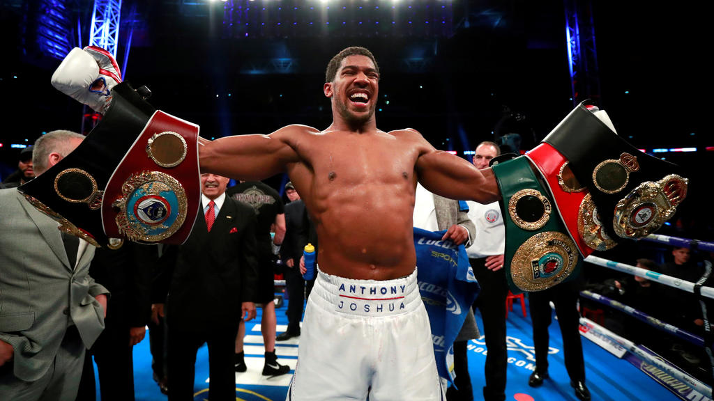 FILE PHOTO: Boxing - Anthony Joshua v Alexander Povetkin - WBA Super, IBF, WBO & IBO World Heavyweight Titles - Wembley Stadium, London, Britain - September 22, 2018 Anthony Joshua celebrates his win against Alexander Povetkin Action Images via Reu