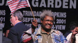 28 Sep 2001:  Don King holds up American flags at the Bernard Hopkins vs Felix Trinidad weigh in for the middleweight unification fight  at Madison Square Garden in New York City.  DIGITAL IMAGE  Mandatory Credit: Al Bello/ALLSPORT