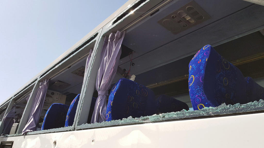 A damaged bus is seen at the site of a blast near a new museum being built close to the Giza pyramids in Cairo, Egypt May 19, 2019. REUTERS/Ahmed Fahmy