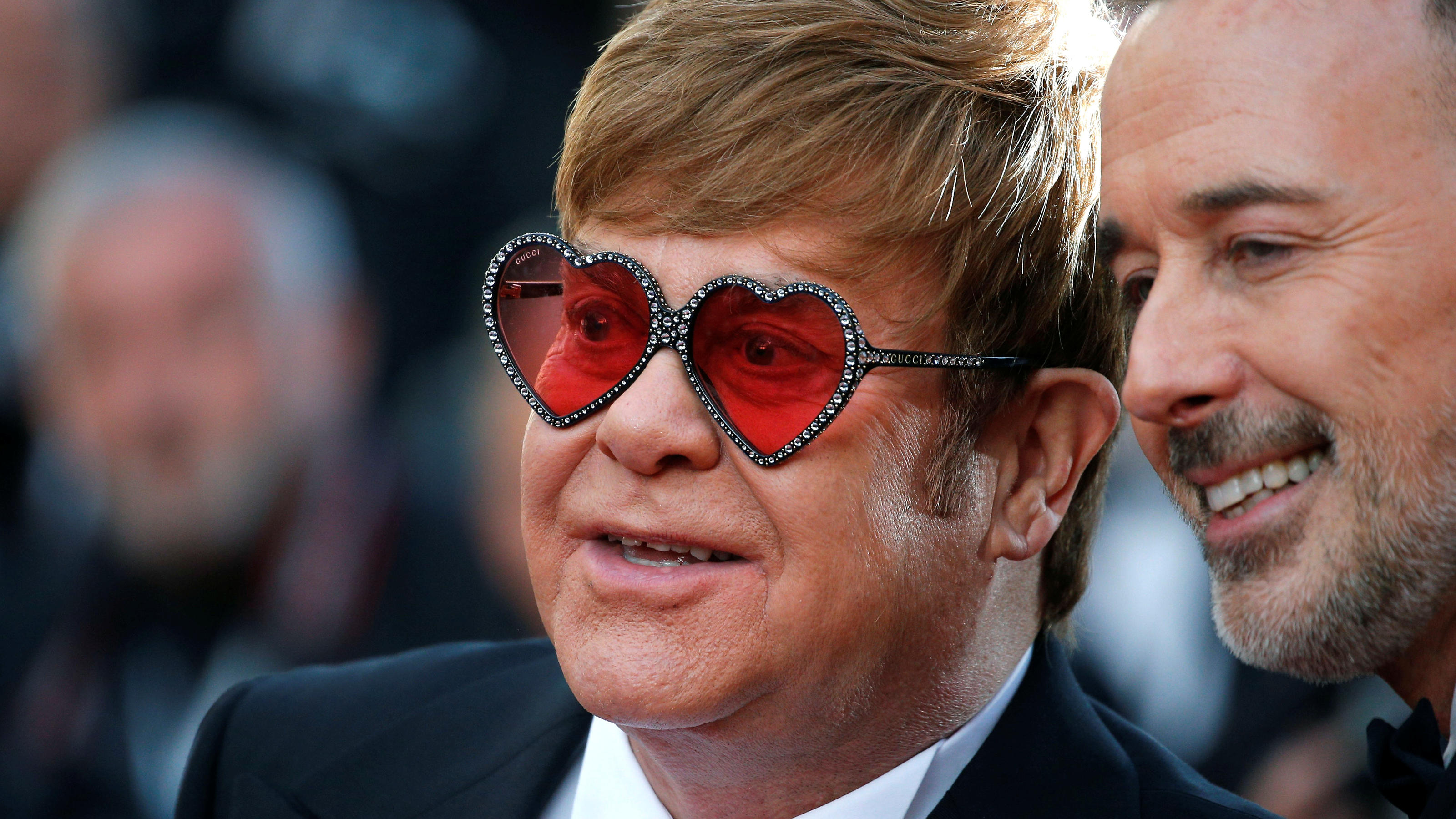 FILE PHOTO: 72nd Cannes Film Festival - Screening of the film "Rocketman" out of competition - Red Carpet Arrivals - Cannes, France, May 16, 2019. Elton John poses with David Furnish. REUTERS/Stephane Mahe/File Photo