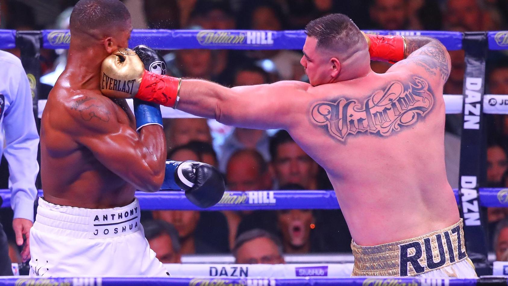 NEW YORK NY JUNE 01 Andy Ruiz Jr of California hits Anthony Joshua of England during the second