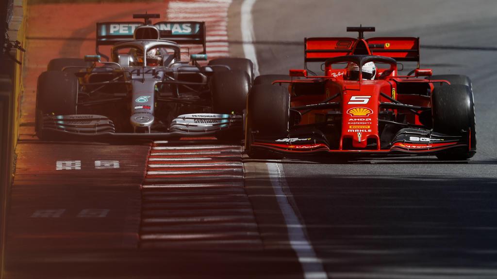 2019 Canadian GP CIRCUIT GILLES-VILLENEUVE, CANADA - JUNE 09: Sebastian Vettel, Ferrari SF90 and Lewis Hamilton, Mercedes AMG F1 W10 battle during the Canadian GP at Circuit Gilles-Villeneuve on June 09, 2019 in Circuit Gilles-Villeneuve, Canada. (Ph