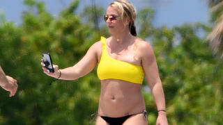 *PREMIUM EXCLUSIVE* Britney Spears wears a yellow bikini as she has an action-packed afternoon on a yacht with boyfriend Sam Asghari in Miami. The couple showed off their form diving off the back of the boat and later recreated a scene from 'Titanic' while relaxing on the front. The singer seemed to put all her troubles behind her as she was seen laughing and smiling throughout the ideal afternoon on the water.08 Jun 2019Pictured: Britney Spears; Sam Asghari.Photo credit: MEGATheMegaAgency.com+1 888 505 6342