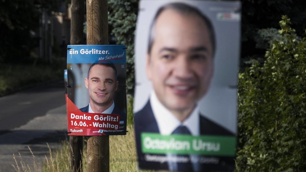 Wahlplakate von Octavian Ursu (CDU) und Sebastian Wippel (AfD), aufgenommen in Goerlitz, 12.06.2019. Ursu (CDU) tritt gegen Wippel (AfD) in einer Stichwahl um das Amt des Oberbuergermeisters an. Bei der ersten Wahl am 26. Mai 2019 erlangte Wippel 36,