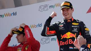 Formula One F1 - Austrian Grand Prix - Red Bull Ring, Spielberg, Austria - June 30, 2019   Red Bull's Max Verstappen celebrates after winning the race as second placed Ferrari's Charles Leclerc looks dejected   REUTERS/Leonhard Foeger