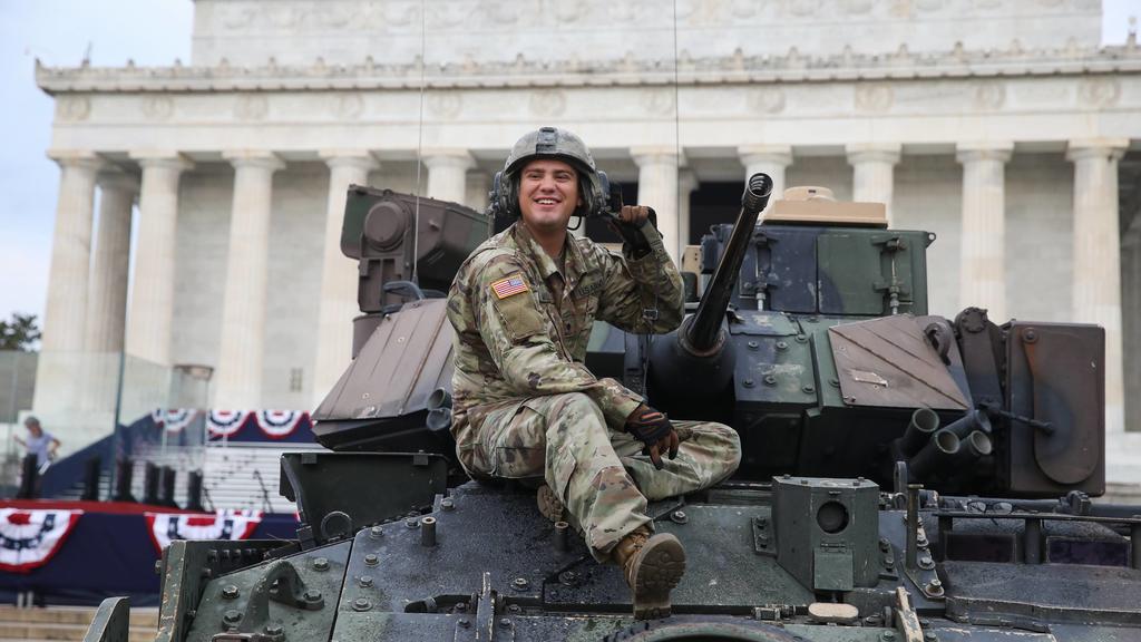 An Army soldier cleans a Bradley Fighting Vehicle at the Lincoln Memorial prior to President Donald Trump s Salute to America Independence Day event honoring the military, Thursday, July 4, 2019, in Washington, D.C. Later today President Trump will h