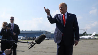U.S. President Donald Trump talks to reporters before boarding Air Force One to return to Washington from Morristown Municipal Airport in Morristown, New Jersey, U.S. July 7, 2019. REUTERS/Jonathan Ernst