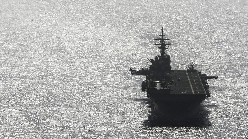 USS Boxer (LHD-4) ship sails near a tanker in the Arabian Sea off Oman July 17, 2019. Picture taken July 17, 2019. REUTERS/Ahmed Jadallah     TPX IMAGES OF THE DAY