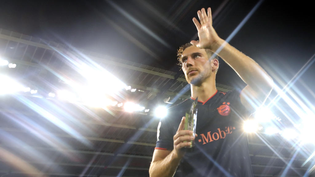 KANSAS CITY, MISSOURI - JULY 23: (EDITORS NOTE: A star effects camera filter was used for this image.) Leon Goretzka of FC Bayern Muenchen is holds the Man of the Match award after the 2019 International Champions Cup match between FC Bayern and AC
