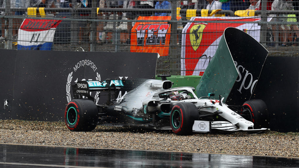 HOCKENHEIM, GERMANY - JULY 28: Lewis Hamilton of Great Britain driving the (44) Mercedes AMG Petronas F1 Team Mercedes W10 crashes during the F1 Grand Prix of Germany at Hockenheimring on July 28, 2019 in Hockenheim, Germany. (Photo by Mark Thompson/