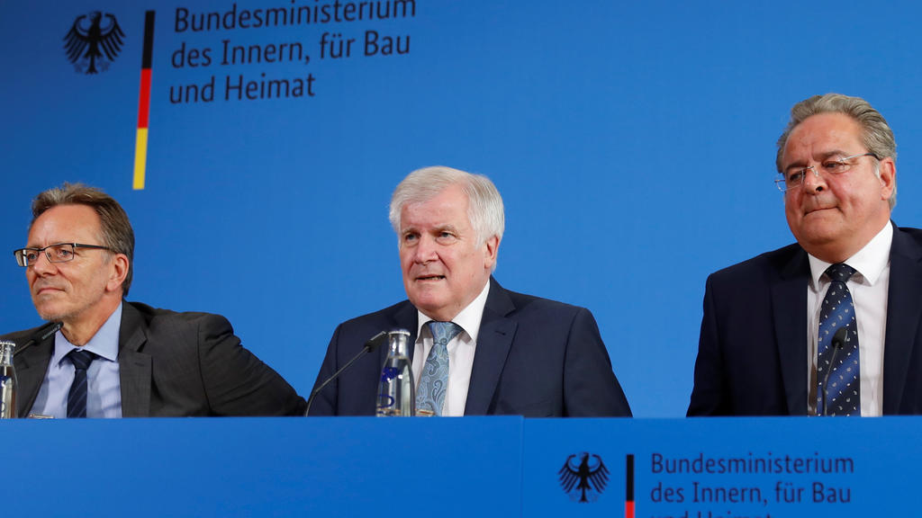 German Interior Minister Horst Seehofer, Holger Muench, Chief Commissioner of Germany's Bundeskriminalamt (BKA) Federal Crime Office and Dieter Romann, Head of German Federal Police, attend a news conference a day after a man killed an 8-year-old boy