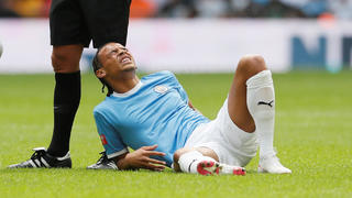 Soccer Football - FA Community Shield - Manchester City v Liverpool - Wembley Stadium, London, Britain - August 4, 2019  Manchester City's Leroy Sane reacts after sustaining an injury   REUTERS/David Klein