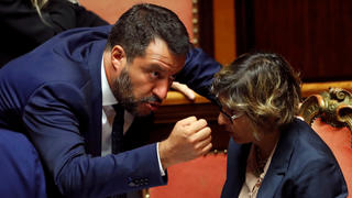 Italy's Interior Minister and Deputy Prime Minister Matteo Salvini and Italy's Minister of Public Administration Giulia Bongiorno gesture as Italy's government is set to face Senate confidence vote on security and immigration decree in Rome, Italy, August 5, 2019 REUTERS/ Remo Casilli