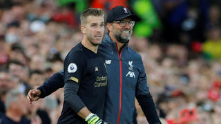 Soccer Football - Premier League - Liverpool v Norwich City - Anfield, Liverpool, Britain - August 9, 2019   Liverpool's Adrian with manager Juergen Klopp before being substituted on    REUTERS/Phil Noble    EDITORIAL USE ONLY. No use with unauthorized audio, video, data, fixture lists, club/league logos or "live" services. Online in-match use limited to 75 images, no video emulation. No use in betting, games or single club/league/player publications.  Please contact your account representative for further details.