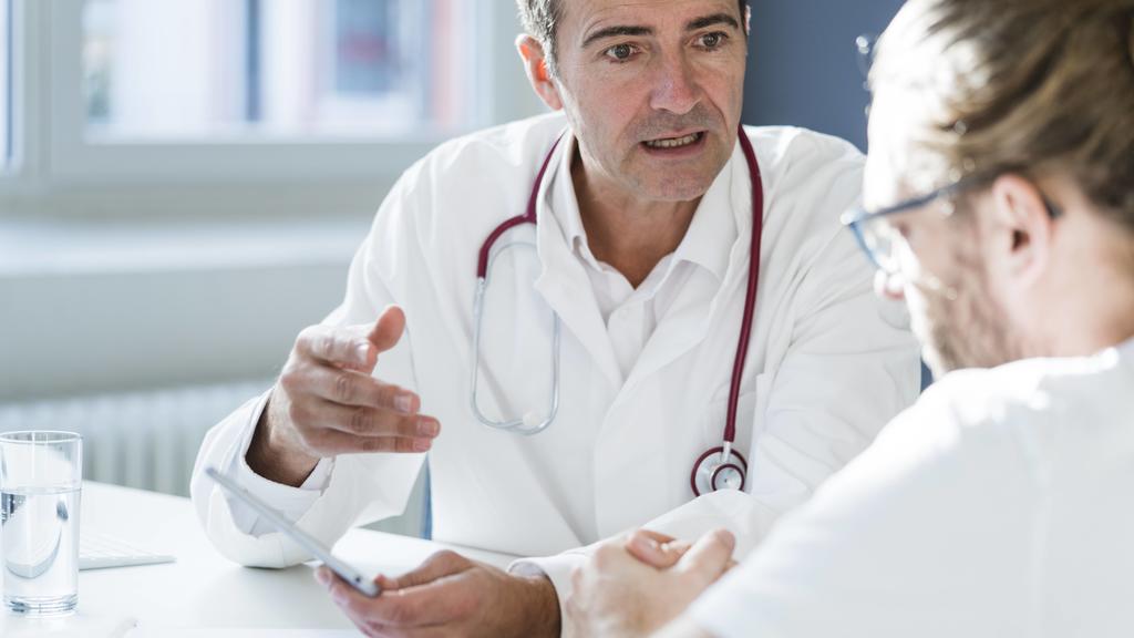 Arzt mit Patient