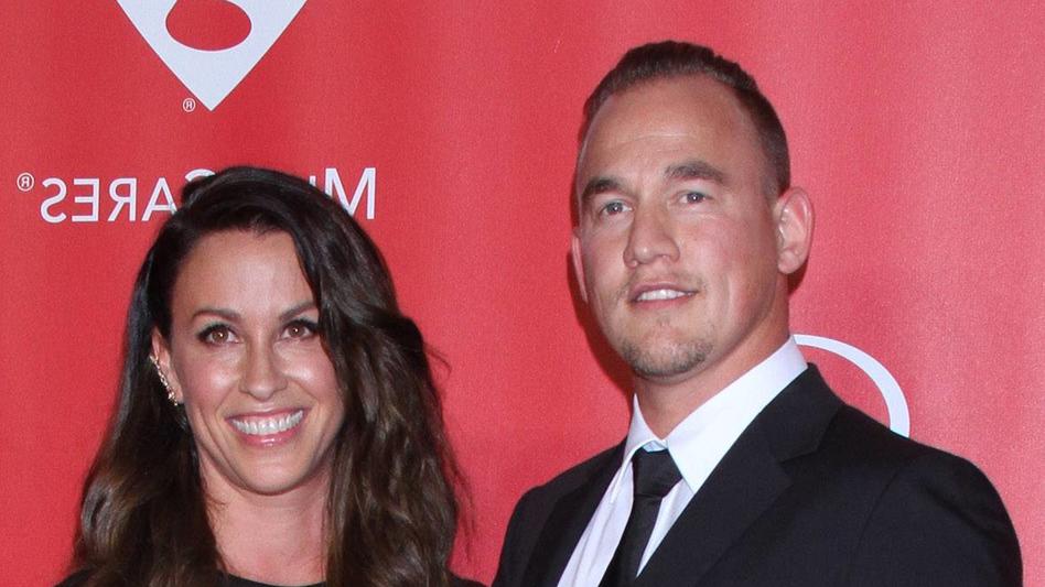 February 6, 2015 - Los Angeles, CA, United States - 6 February 2015 - Los Angeles, California - Mario Treadway, Alanis Morissette. 2015 MusiCares Person Of The Year Gala Honoring Bob Dylan held at the Los Angeles Convention Center. Photo Credit: AdMe