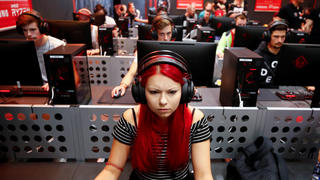 Gamers play during the first day of Europe's leading digital games fair Gamescom, which showcases the latest trends of the computer gaming scene in Cologne, Germany, August 21, 2019. REUTERS/Wolfgang Rattay