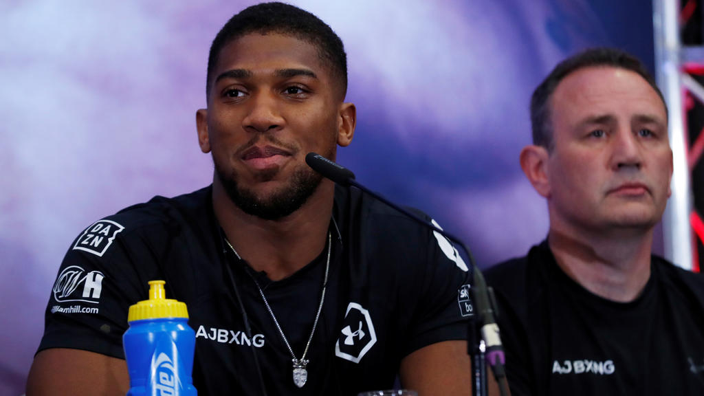 Boxing - Andy Ruiz Jr & Anthony Joshua Press Conference - Hilton London Syon Park, London, Britain - September 6, 2019 Anthony Joshua and trainer Rob McCracken during the press conference Action Images via Reuters/Peter Cziborra