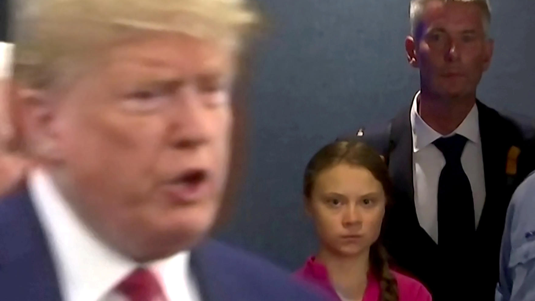 Swedish environmental activist Greta Thunberg watches as U.S. President Donald Trump enters the United Nations to speak with reporters in a still image from video taken in New York City, U.S. September 23, 2019.  REUTERS/Andrew Hofstetter     TPX IMA