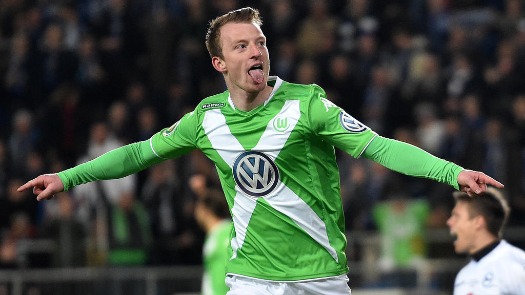 BIELEFELD, GERMANY - APRIL 29:  Maximilian Arnold of Wolfsburg celebrates after scoring his team's fourth goal during the DFB Cup Semi Final match between Arminia Bielefeld and VfL Wolfsburg at Schueco Arena on April 29, 2015 in Bielefeld, Germany.  