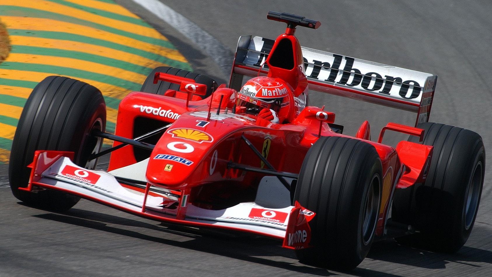 ARCHIV - 29.03.2002, Brasilien, Sao Paulo: Formel-1-Pilot Michael Schumacher im Ferrari F2002 während eines Zeittrainings auf der Rennstrecke von Interlagos bei Sao Paulo. Der legendäre Rennwagen wird nun im Rahmen des Formel-1-Saisonfinales in Abu D