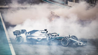  2019 Abu Dhabi GP YAS MARINA CIRCUIT, UNITED ARAB EMIRATES - DECEMBER 01: Max Verstappen, Red Bull Racing RB15, 2nd position, and Lewis Hamilton, Mercedes AMG F1 W10, 1st position, perform donuts in celebration at the end of the race during the Abu Dhabi GP at Yas Marina Circuit on December 01, 2019 in Yas Marina Circuit, United Arab Emirates. Photo by LAT Images Images PUBLICATIONxINxGERxSUIxAUTxHUNxONLY W6I0431