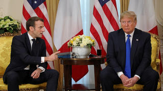 France's President Emmanuel Macron gestures during the meeting with U.S. President Donald Trump, ahead of the NATO summit in Watford, in London, Britain, December 3, 2019. Ludovic Marin/Pool via REUTERS