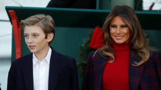 First lady Melania Trump and her son Barron Trump welcome the official White House Christmas Tree, a Wisconsin-grown tree provided by the Chapman family of Silent Night Evergreens, to the White House in Washington DC, U.S. November 20, 2017.  REUTERS/Carlos Barria