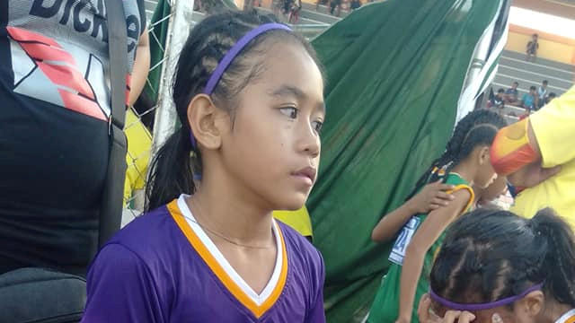 Rhea Bullos, 11, wears tape as makeshift running shoes during a 1500-meter run at the Iloilo Sports Complex, in Iloilo, Philippines December 9, 2019. Picture taken December 9, 2019. Predirick Valenzuela/Handout via REUTERS THIS IMAGE HAS BEEN SUPPLI