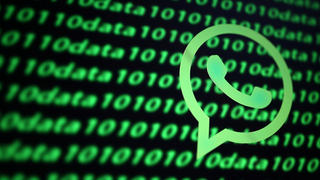 The Whatsapp logo and binary cyber codes are seen in this illustration taken November 26, 2019. REUTERS/Dado Ruvic/Illustration