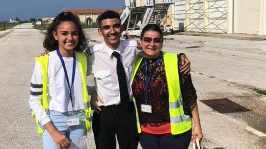 Seth Van Beek (centre) who has become the UK's youngest qualified commercial pilot aged just 18. He is pictured here with his mum Frances Van Beek and sister Hannah Van Beek. See SWNS story SWYpilot. A British teenager ha