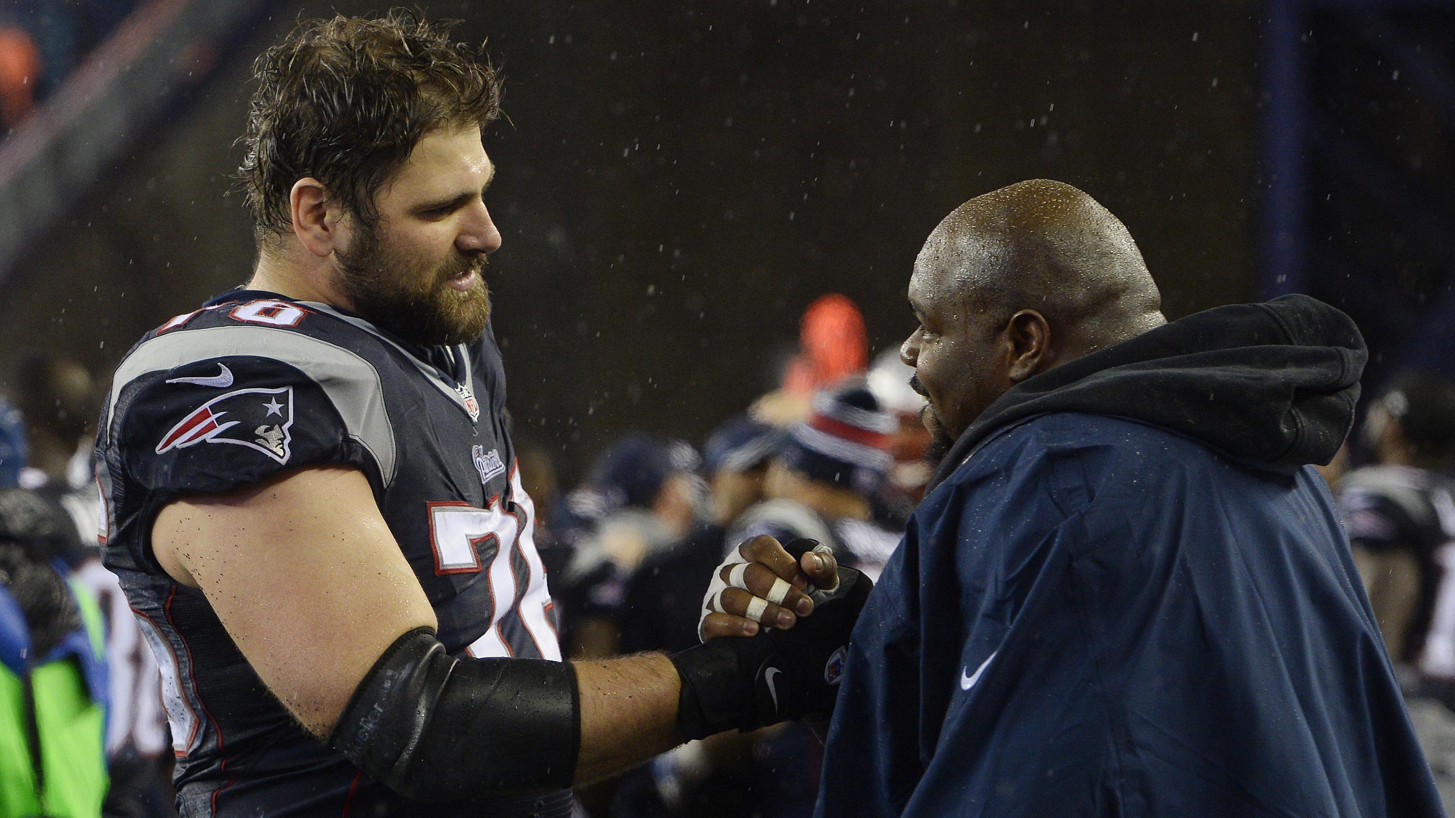 epa04567970 New England Patriots Sebastian Vollmer (L) and Vince Wilfork (R) celebrate after the AFC Championship game at Gillette Stadium in Foxborough, Massachusetts, USA, 18 January 2015. The Patriots defeated the Colts and will go on to face the 