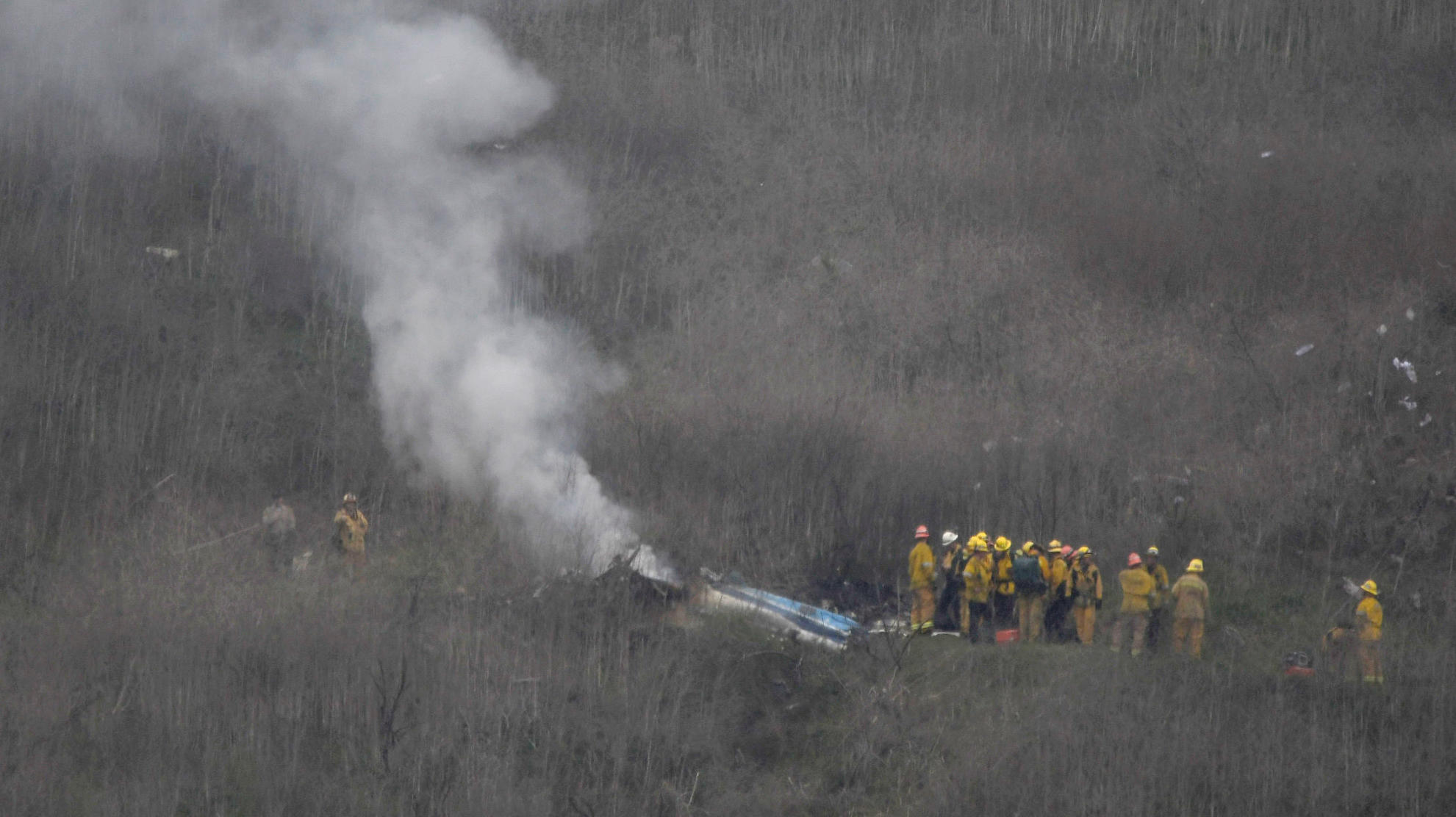 LA county firefighters on the scene of a helicopter crash that reportedly killed Kobe Bryant in Calabasas, California, U.S., January 26, 2020. REUTERS/Gene Blevins